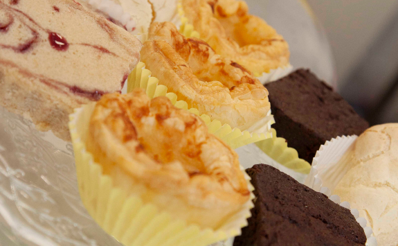 Cakes on a stand in the cafe